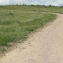 Es gibt 2 Parkplätze, vom nördlichen sind es ca. 1 Kilometer Fußweg bis zu den bunten Minen, ab dem südlichen Parkplatz ist es etwas kürzer. Noch näher dran ist man ab dem Overlook zwischen diesen beiden Plätzen, hier braucht man nur auf einen Trampelpfad ins Tal gehen und schon ist man da.<br />Das war uns aber zu einfach bzw. wir haben erst im nachhinein davon erfahren als wir nach unserer Wanderung die nähere Umgebung per Auto erkundet haben. Wir gingen deshalb bei eisigem Wind leicht bergauf durch sehr langweiliges Grasland.
