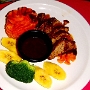 1.12.2015<br />Jerk Pork Tenderloin: Pan Fried and finished with a spicy rum sauce, served with tomato mash & steamed plantain<br />54 BDB$