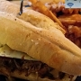 14.9.2016<br />Cuban Sandwich im Puffin on 101 in Forks/WA<br /> Our mouthwatering garlic pork, grilled ham, pepper jack cheese, pickles, tomatoes, red onions & spicy mustard on toasted bread served with seasoned waffle fries