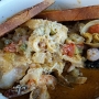 21.9.2016<br />Cioppino im Point Noyo Restaurant in Fort Bragg/CA<br />Sauteed Prawns, Mussels, Clams, Rock Cod, Bay Shrimp, Celery, Onions & Tomatoes in a Tomato Cream Broth topped with Chimichurri Sauce Asiago & Garlic Toast.<br />In Spanien würde man Zarzuela dazu sagen. Scharf und sehr, sehr lecker, auch wenn's nicht so aussieht.....