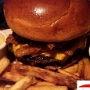 29.9.2016<br />THE BLOOMIN' BURGER im Outback Bakersfield/CA<br />Topped with Bloomin' Onion petals, American cheese, lettuce, tomato and our spicy signature bloom sauce.