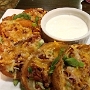 1.6.2017<br />Loaded Potatoes $12 in der Explorers Lounge im Hotel Lake Louise Inn<br />Potato skins loaded with sweet peppers, green onions, bacon bits, and melted cheese.<br />Served with sour cream.
