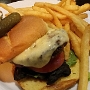 1.6.2017<br />Grass Fed Elk Cheeseburger $23 in der Explorers Lounge im Hotel Lake Louise Inn<br />Made in house, topped with smoked Gouda cheese, tomatoes, Bermuda onions, and Artisan greens.<br />Served on a golden brioche bun.