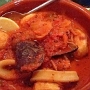 9.12.2017<br />Restaurant Landau, Langendreer<br />Zarzuela 15.50 €<br />Spanische Fischpfanne mit Fischfilets, Muscheln, Tintenfisch und Kartoffeln in Anis-Tomaten-Sahne zu grünem Salat