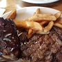 15.9.2018<br />Ribeye 10 oz.<br />with Ribs (1350 cal.) 21.99 im Texas Roadhouse in Joliet/IL<br />21,99 $