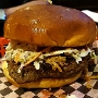 16.9.2018<br />Piggy Back Burger in Ozzie's Burger Bar im Casino Lumiere in St. Louis/MI<br />8 oz custom Burger topped with out very own in-house smoked pulled pork, creamy coleslaw and dresses with sweet Baby Ray's bbqeue Sauce.<br />11,95 $