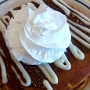 30.9.2018<br />Pumpkin Cinn-A-Stack beim IHOP in<br />Pumpkin Pancakes made with real pumpkin and seasonal spices, layered witth cinnamon roll filling, then topped with cream cheese icing and crowned with creamy whipped topping.