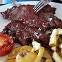 24.9.2019<br />gegrillte Schulter vom iberischen Schwein im Asador On Egin, Passatge Portixol, Cala en Bosc, Menorca<br />15,95 €