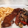 2.10.2019<br />Secreto ibérico a la Brasa im Restaurante Pizzeria Noray, Passatge Portixol, Cala en Bosc, Menorca<br />16,50 €