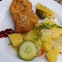 12.8.2023 - WIENER SCHNITZEL -VOM KALB, serviert vom Tucholsky<br />Kartoffel-Gurkensalat | Baumkarper | Preiselbeeren | Zitrone - 12,50 €