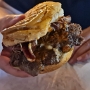 09.11.2024 - Tony Burger - Lettuce - Tomato - Bacon - Caramelized Onions - Piri Piri - Barbeque Sauce - Pickle - 007 Sauce bei Rebell Burger am Dover Beach/Barbados beide Burger plus Pommes für 80 BD$