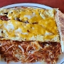 16.03.2025 - The western Three Egg Omelette - Ham, Bacon, Onion & Mild Cheddar Cheese - im Knotty Pine Restaurant and Lounge in Caliente/NV - 13,34 $ incl. Icetea
