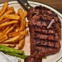 18.03.2025 - RibEye Steak mit Pommes und Spargel im Ruby's Inn - 38 $ - lecker