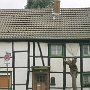 Dieser Kotten wurde bereits 1542 in Dokumenten als "Sruynkhuiß" oder "Seiinghus" erwähnt. Mitte des 19. Jh betrieb Heinrich Müser hier eine Schnapsbrennerei. Später wurde es als Bäckerei genutzt.