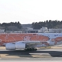All Nippon Airways - Airbus A380-841 - JA383A "Flying Honu - Ra (Orange Turtle)" special colours<br />NRT - Terminal 1 Observatory - 22.03.2024 - 15:40