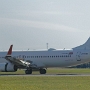 Norwegian Air Shuttle - Boeing 737-8JP(WL) - LN-NIB "Helmer Hanssen"  tail design - die selbe Maschine wie im letzten Bild, von der anderen Seite geknipst. Hier ist das Bild ziemlich verwaschen.<br />OSL - Gardermoen Flight Spotting West - 19.7.2023 - 13:40