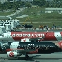 AirAsia - Airbus A320-216 - 9M-AQM "De'Xandra Scents of Life" special colours<br />AirAsia - Airbus A320-251N(WL) - 9M-AGF<br />KUL - KLIA2 - 26.3.2023 - 15:06