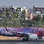 Air Asia - Airbus A320-251N - 9M-NEO "A320neo" special colours<br />HKT - Louis' Runway View Hotel Zimmer 403 - 28.3.2023 - 8:39