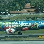 Indonesia Air Asia - Airbus A320-216 - PK-AXD "Colours of Indonesia" special colours<br />SIN - Gate C20 Terminal 1 Changi - 20.3.2023 - 11:31