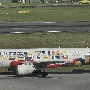Indonesia Air Asia - Airbus A320-214 - PK-AZI "Let's Go To Belitung" special colours<br />SIN - Crowne Plaza Runway View Room 811 - 17.3.2023 - 9:20