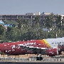 Thai VietJetAir - Airbus A320-214 (WL) - HS-VKA "Welcome to Thailand" special colours <br />HKT - Louis' Runway View Hotel Zimmer 403 - 28.3.2023 - 8:06