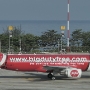 Air Asia - Airbus A320-214 - 9M-AHY ""BIG Duty Free" special colours"<br />HKT - 26.3.2023 - Terminal 1 - 9:20