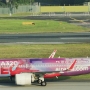 Air Asia - Airbus A320-251N - 9M-NEO "A320neo" special colours<br />SIN - 17.3.2023 - Crowne Plaza Runway View Room 811 - 7:53
