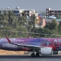 Air Asia - Airbus A320-251N - 9M-NEO "A320neo" special colours<br />HKT - 28.3.2023 - Louis' Runway View Hotel Zimmer 403 - 8:39