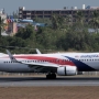 Malaysia Airlines -  Boeing 737-8H6 - 9M-MXN<br />HKT - 28.3.2023 - Louis' Runway View Hotel Zimmer 403 - 9:35