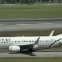 Myanmar National Airlines - Boeing 737-8U3 (WL) - XY-ALV<br />SIN - 17.3.2023 - Crowne Plaza Runway View Room 811 - 11:31