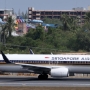 Singapore Airlines - Boeing 737-8SA(WL) - 9V-MGM<br />HKT - 21.3.2023 - Louis' Runway View Hotel Zimmer 403 - 11:52