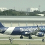 Spring Airlines - Airbus A320-214 - B-6902 "Booking.com" special colours <br />DMK - 24.3.2023 - National Terminal Gate 35 - 15:33