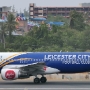 Thai Air Asia - Airbus A320-216 - HS-ABV "Leicester City Football Club" special colours<br />HKT - 28.3.2023 - Louis' Runway View Hotel Zimmer 403 - 16:33