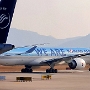 Korean Air - Boeing 777-3B5(ER) - HL7203 - "We are our pride" sticker - mit Handy aus dem Flugzeugfenster geknipst<br />INC - 13.03.2024 - 16:44
