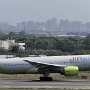 Jin Air - Boeing 777-2B5ER - HL7743<br />TPE - Terminal 2 Observatory South - 24.03.2024 - 13:58